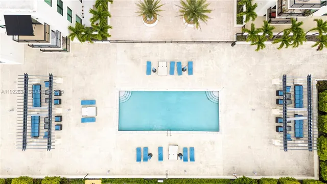 a bathroom with a sink mirror and vanity