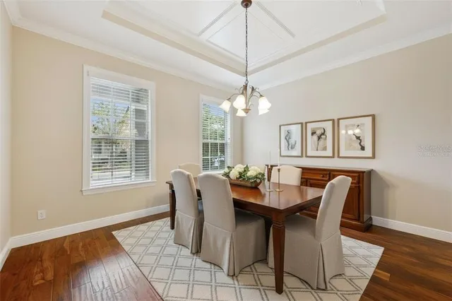 a bedroom with a bed and a potted plant