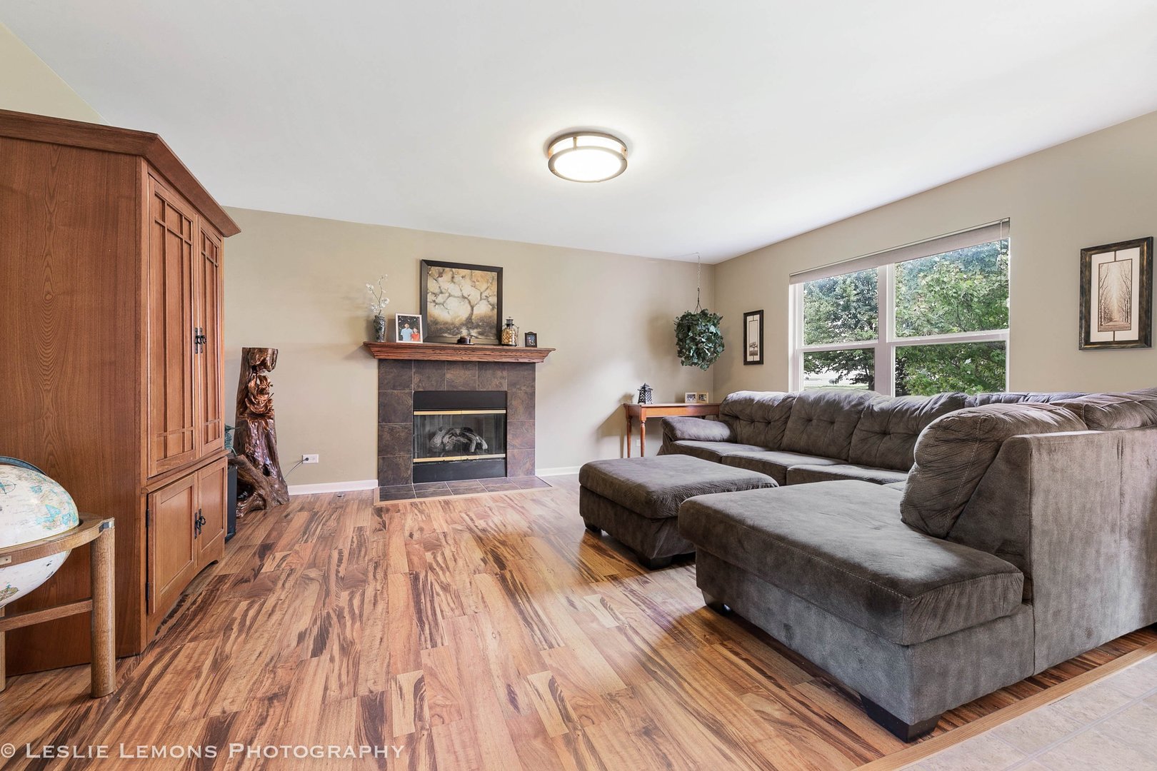 128 Reston Court Sycamore, IL 60178 - Photo 14 of 30 a living room with furniture and a fireplace