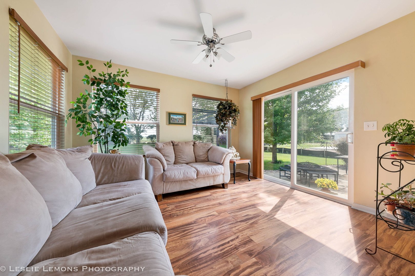 128 Reston Court Sycamore, IL 60178 - Photo 17 of 30 a living room with furniture and a large window with garden view