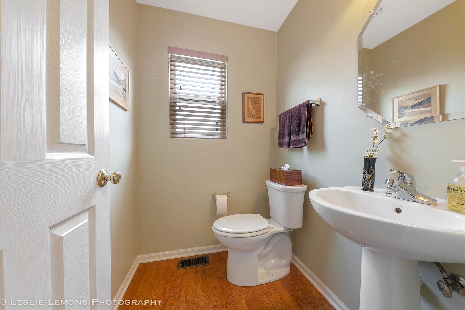 128 Reston Court Sycamore, IL 60178 - Photo 25 of 30 a bathroom with a sink and a toilet