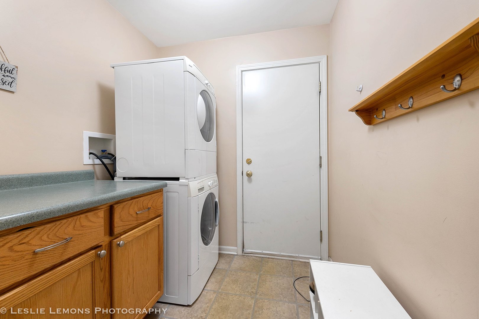 128 Reston Court Sycamore, IL 60178 - Photo 27 of 30 a room with a mirror and a wooden door
