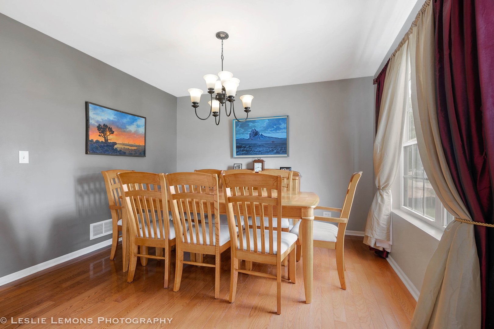 128 Reston Court Sycamore, IL 60178 - Photo 7 of 30 a view of a dining room with furniture wooden floor and chandelier