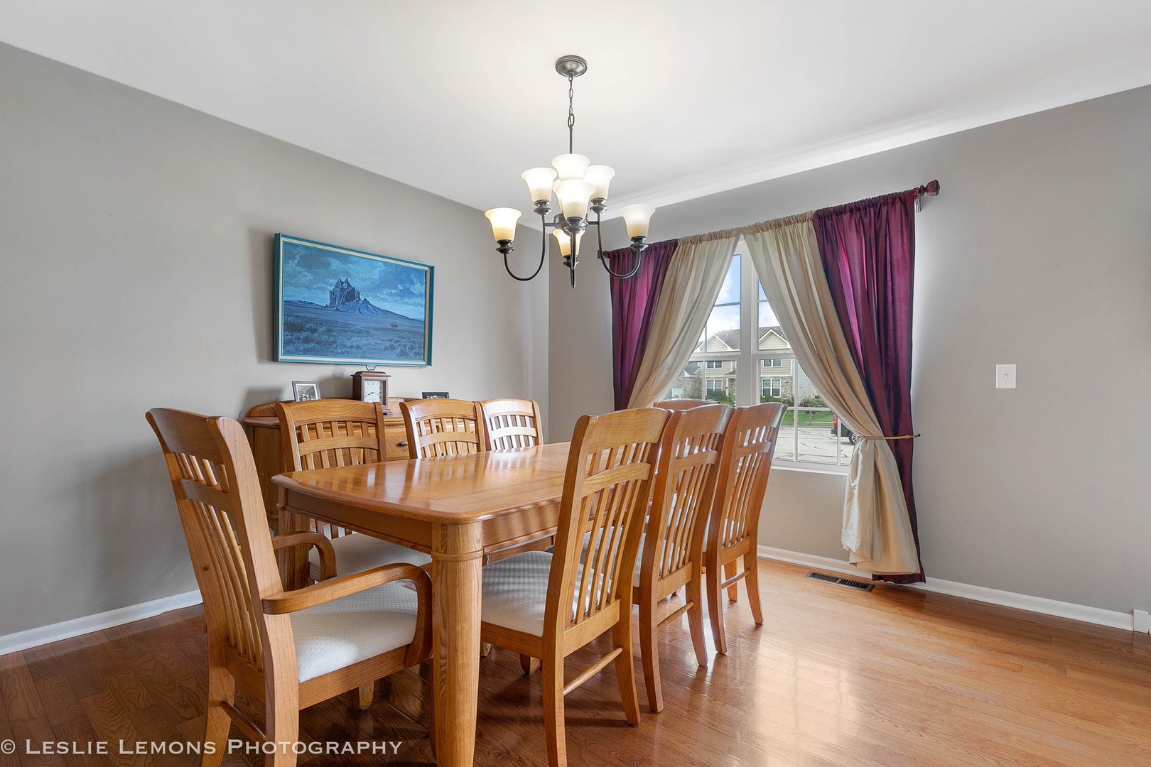 128 Reston Court Sycamore, IL 60178 - Photo 9 of 30 a view of a dining room with furniture window and wooden floor