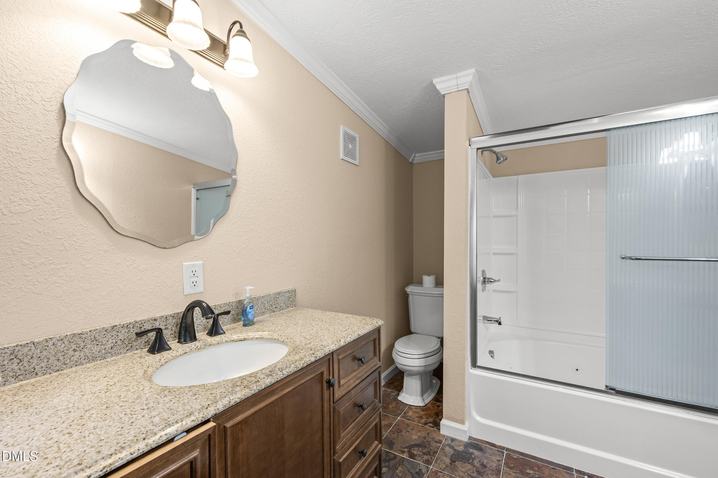 221 Pinkney Church Road Fremont, NC 27830 - Photo 20 of 36 a bathroom with a granite countertop sink mirror vanity and toilet