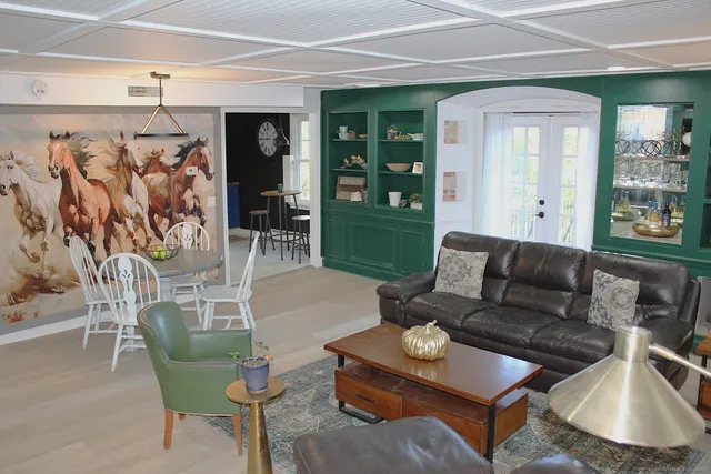 a living room with furniture and a window