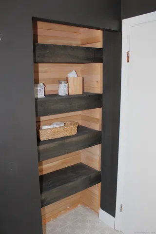 a bathroom with a shower and a bath tub