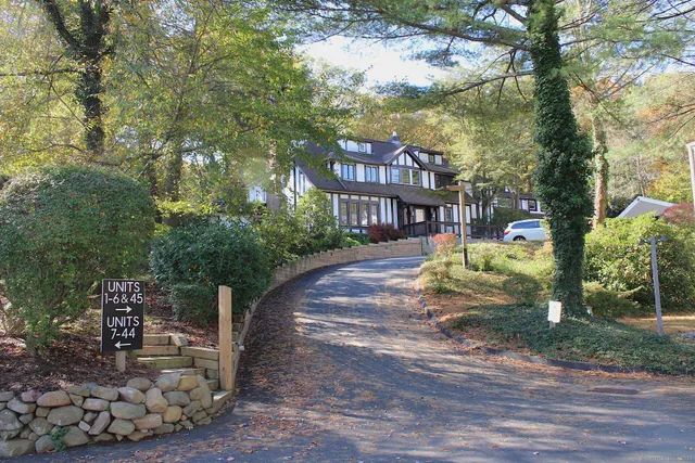 a house with yard in front of it