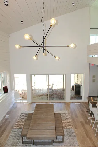 a view of a dining room with furniture window and outside view