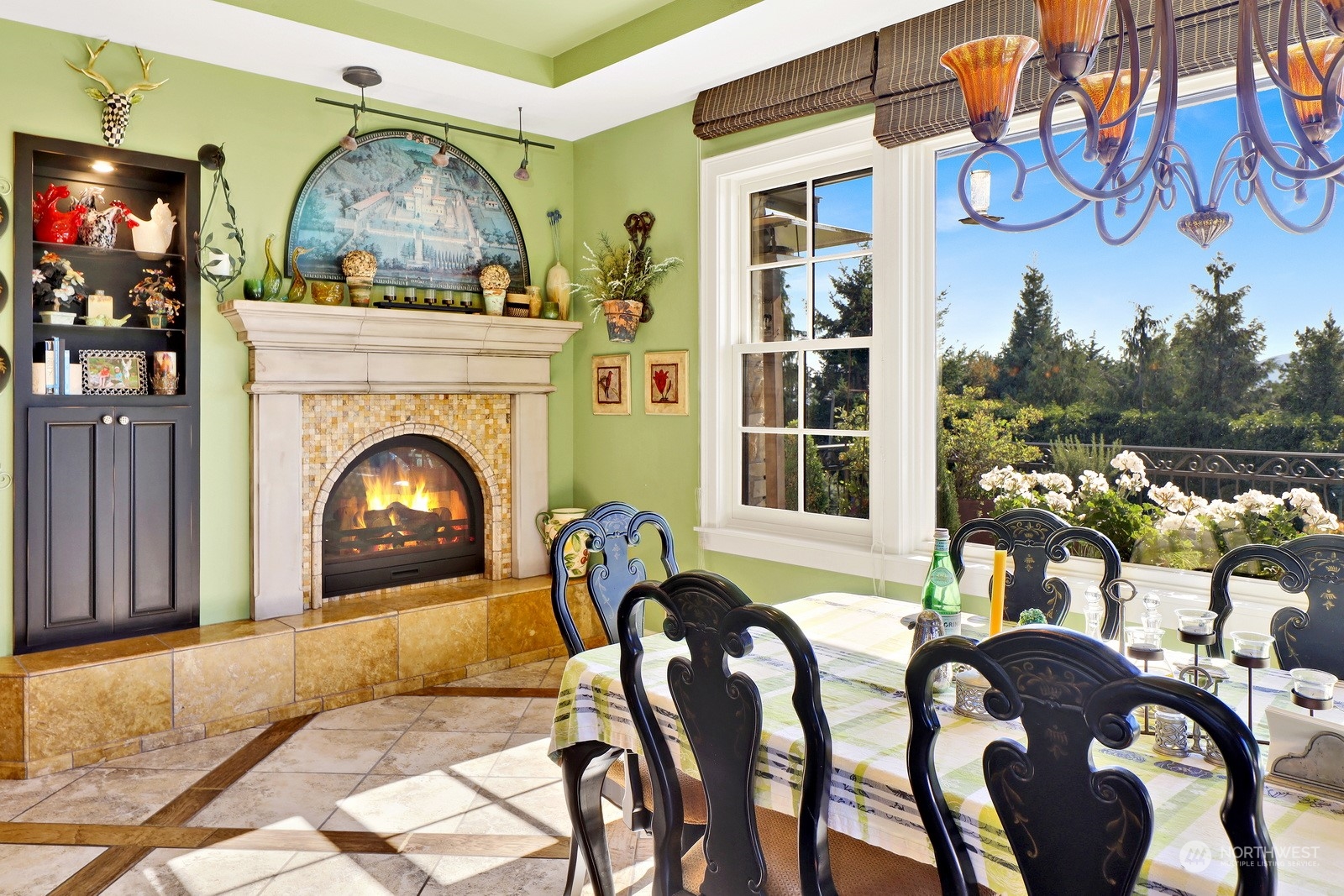 329 Bayside Road Bellingham, WA 98225 - Photo 14 of 40 a living room with furniture a fireplace and a floor to ceiling window