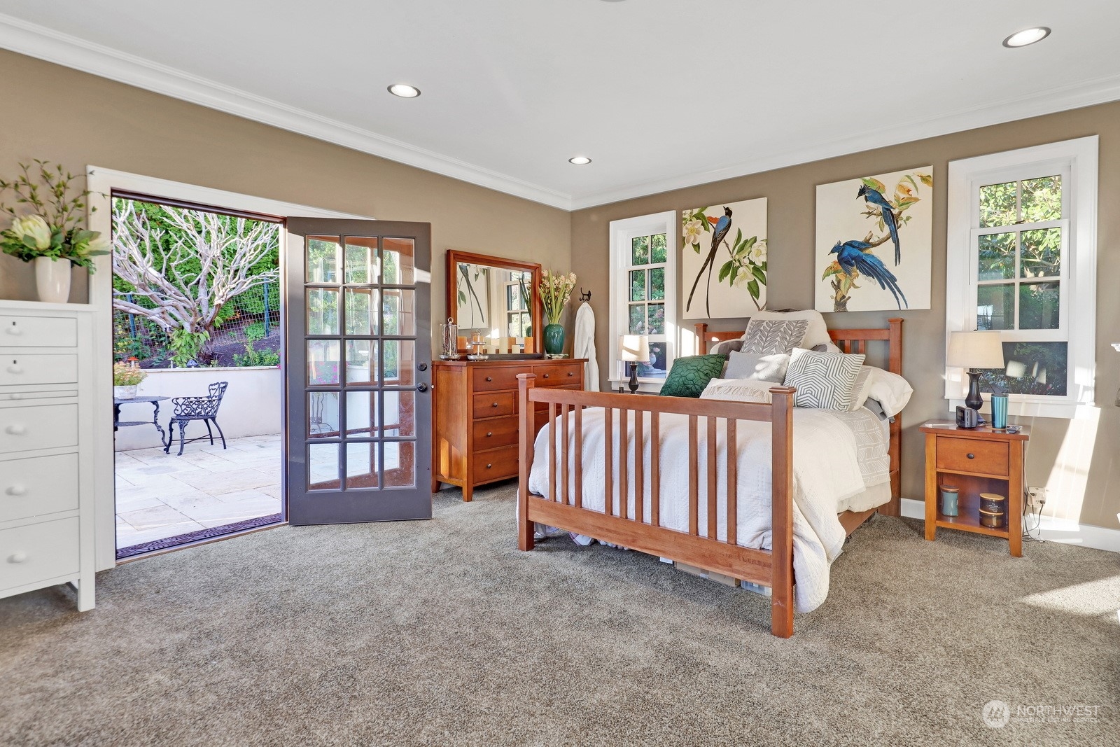 329 Bayside Road Bellingham, WA 98225 - Photo 19 of 40 a spacious bedroom with a large bed and a large window