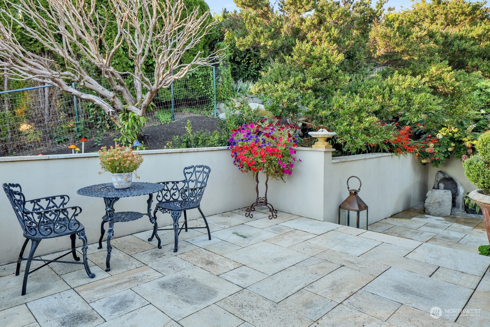 329 Bayside Road Bellingham, WA 98225 - Photo 23 of 40 a backyard of a house with table and chairs