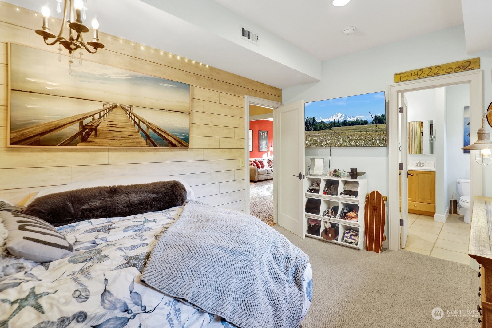 329 Bayside Road Bellingham, WA 98225 - Photo 27 of 40 a bedroom with a bed and a walk in closet