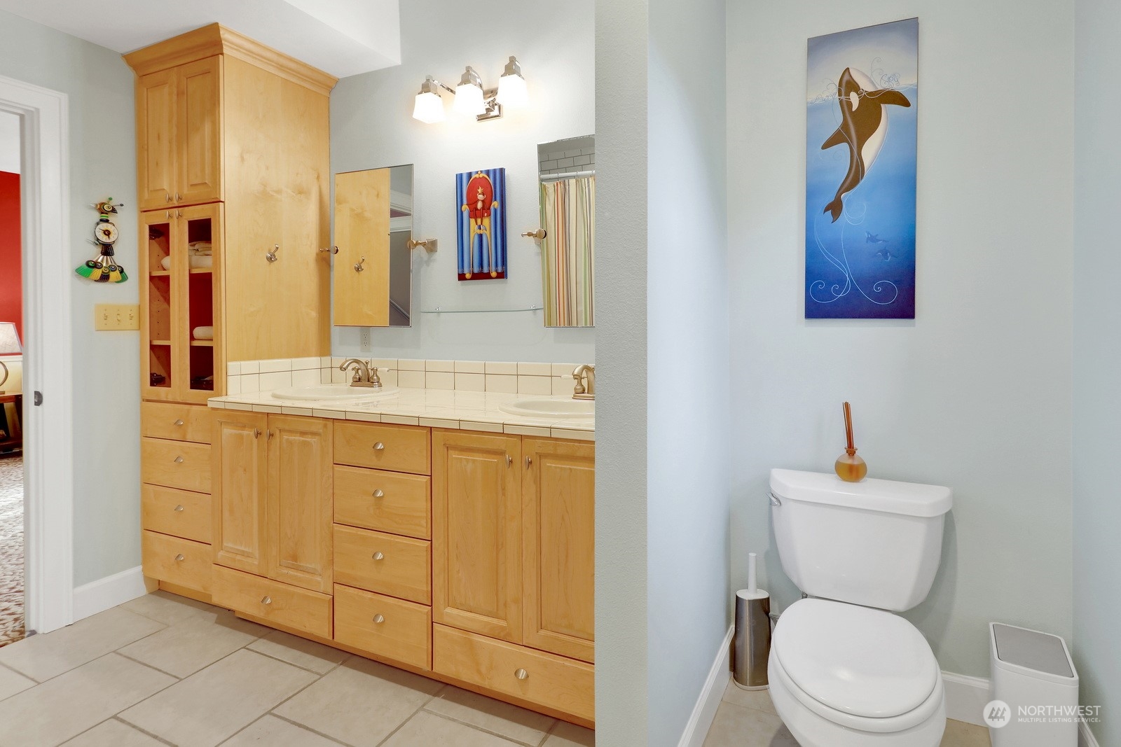329 Bayside Road Bellingham, WA 98225 - Photo 28 of 40 a bathroom with a sink vanity mirror and toilet