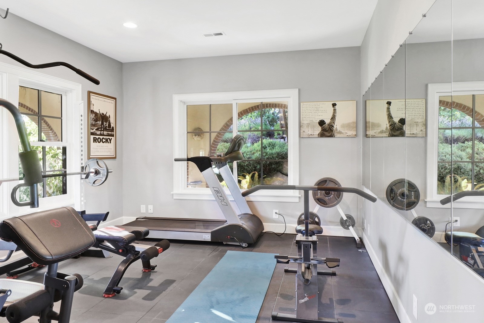 329 Bayside Road Bellingham, WA 98225 - Photo 29 of 40 a room with gym equipment and a large window