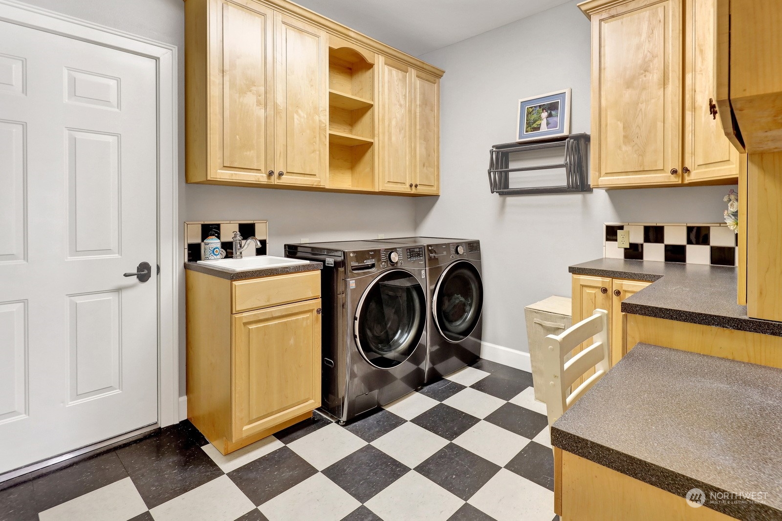 329 Bayside Road Bellingham, WA 98225 - Photo 30 of 40 a utility room with sink dryer and washer