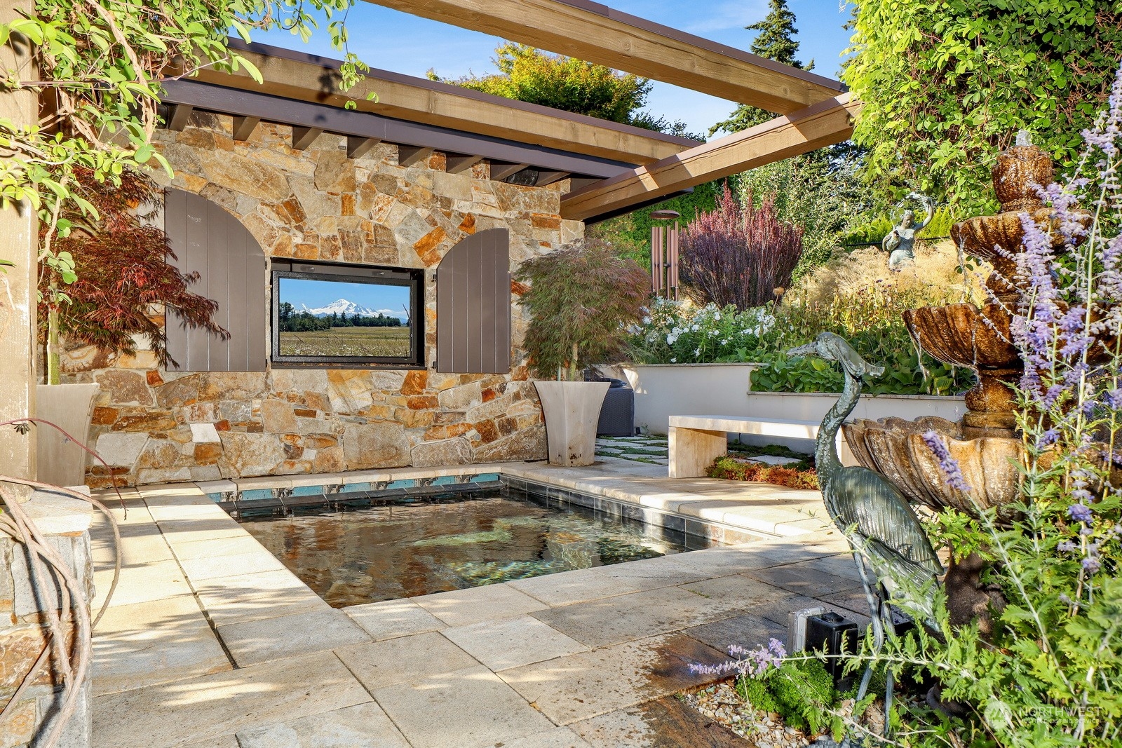 329 Bayside Road Bellingham, WA 98225 - Photo 38 of 40 a view of a patio with a table and chairs