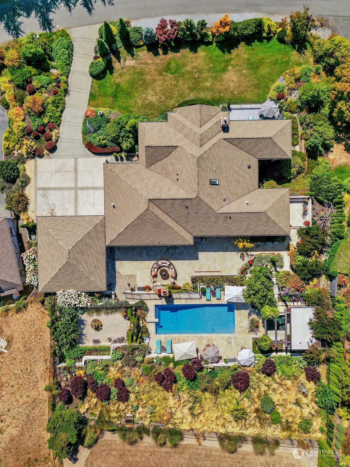329 Bayside Road Bellingham, WA 98225 - Photo 4 of 40 an aerial view of a house with a yard basket ball court and outdoor seating