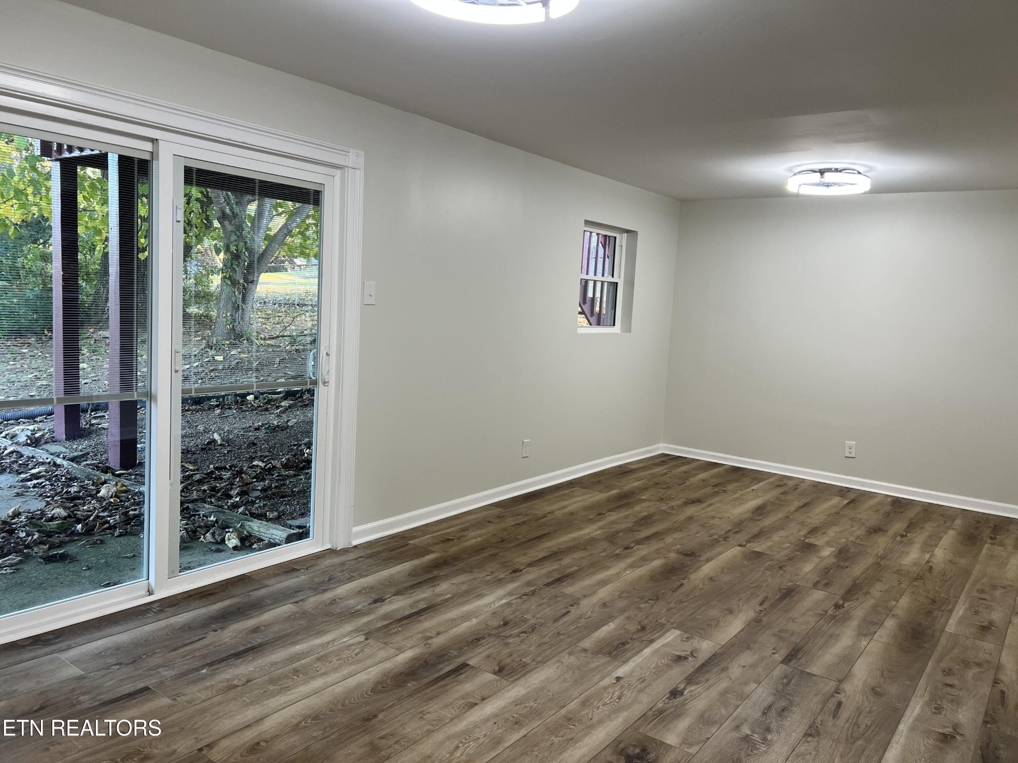 244 Peterson Road Knoxville, TN 37934 - Photo 33 of 46 a view of wooden floor and windows in a room
