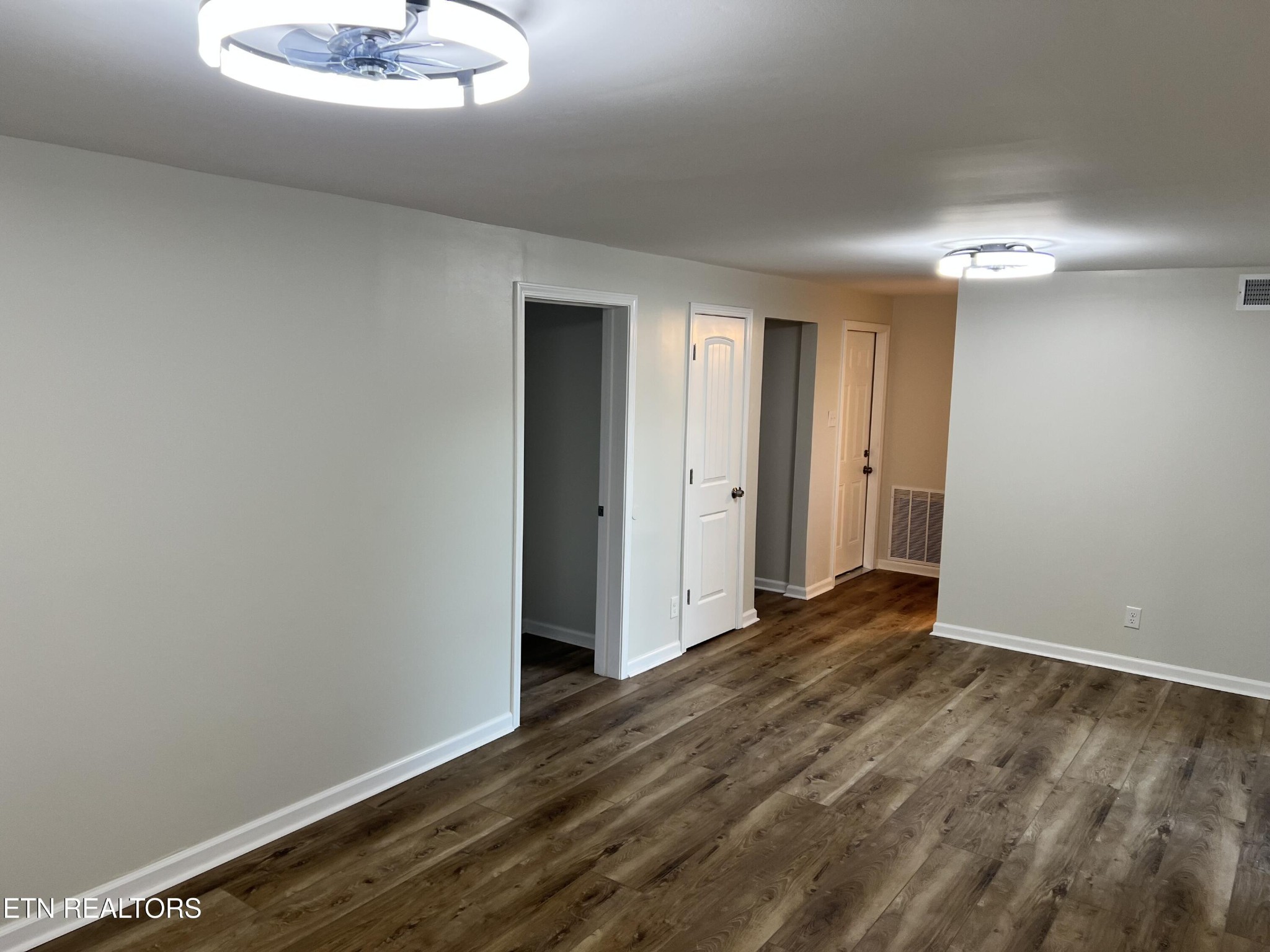 244 Peterson Road Knoxville, TN 37934 - Photo 35 of 46 a view of an empty room with wooden floor and a window