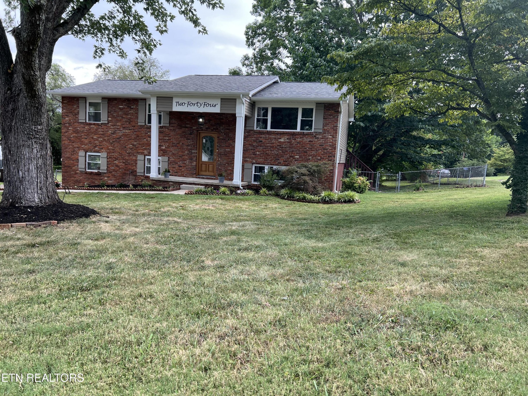 244 Peterson Road Knoxville, TN 37934 - Photo 46 of 46 a front view of a house with a garden