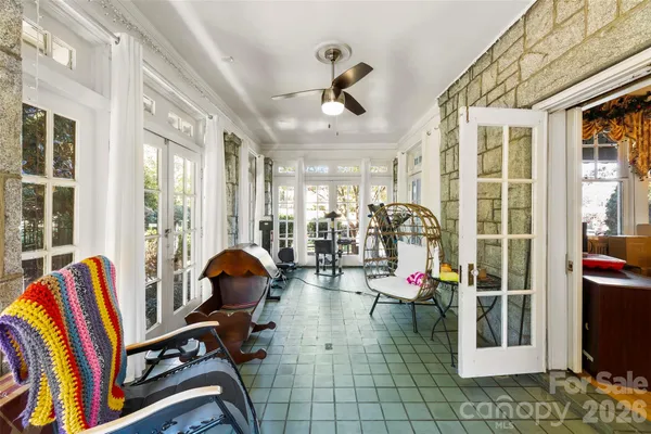 a view of gym equipment and windows