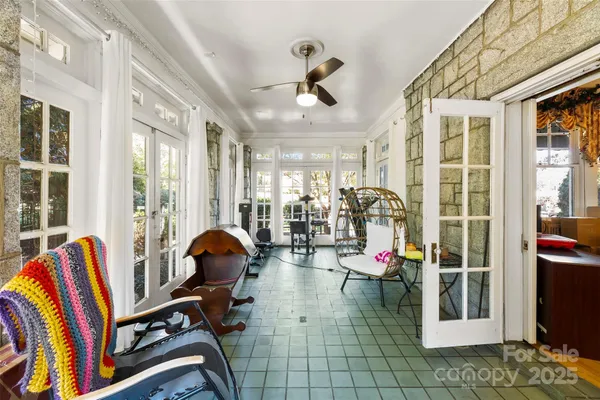 a view of gym equipment and windows