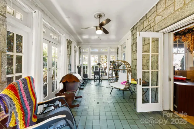 a view of gym equipment and windows