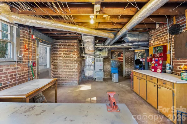 a view of a porch with furniture and a fireplace