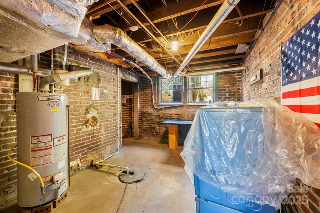 a view of a porch with furniture and a fireplace