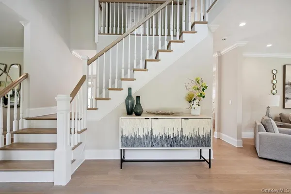 a view of entryway livingroom and hall
