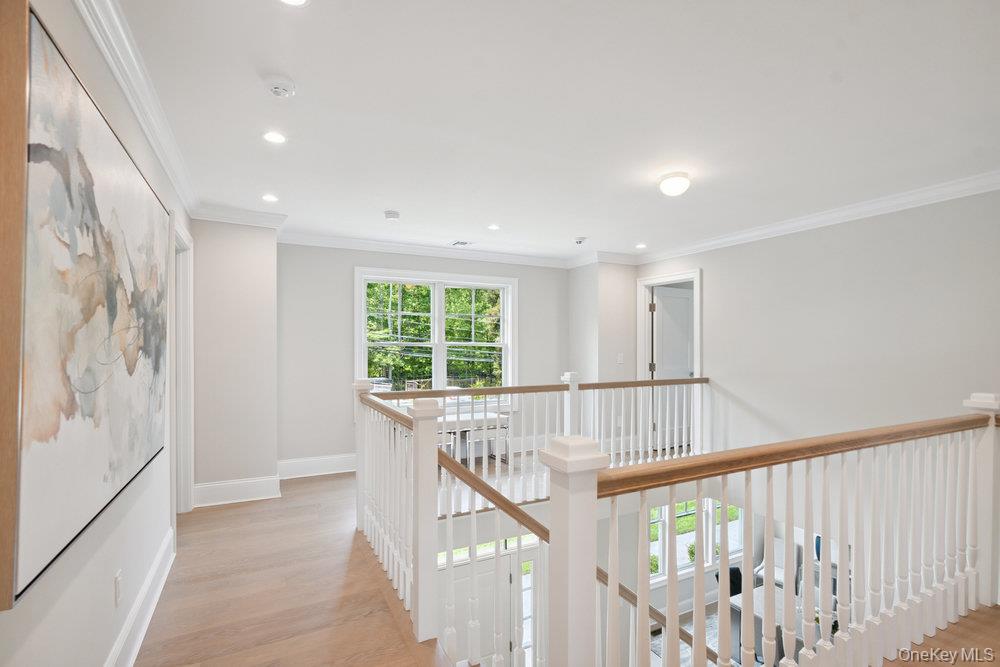 46 Plainview Road Woodbury, NY 11797 - Photo 31 of 46 a view of an entryway with wooden floor
