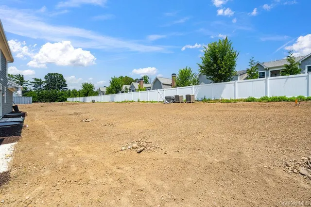 a aerial view of a house with a garden and plants