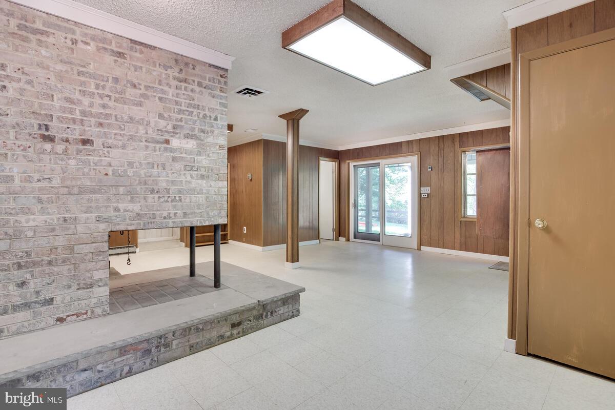 2645 Aspen Road Port Republic, MD 20676 - Photo 39 of 51 a view of an entryway with a bench