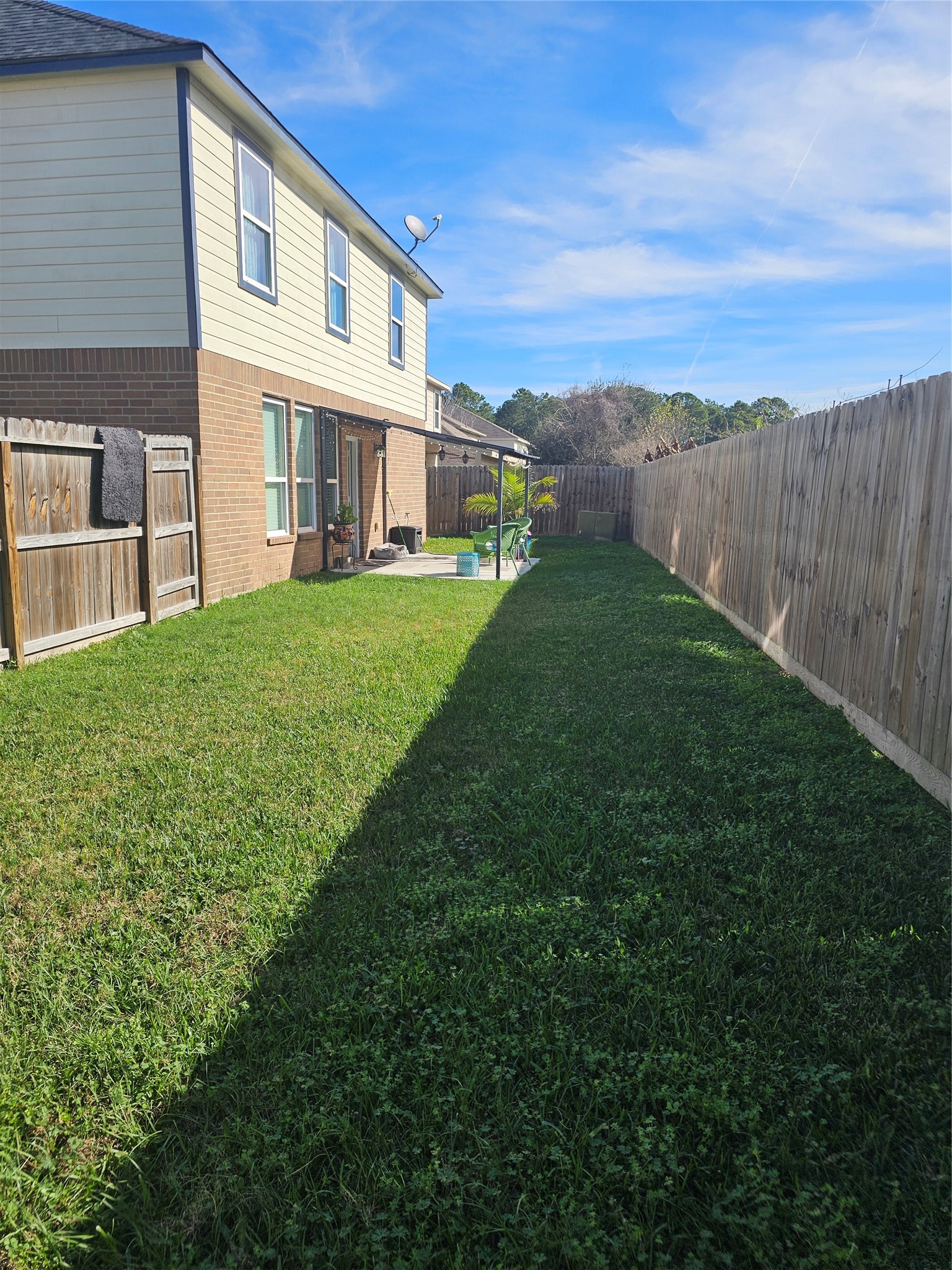 1726 Sun Point Court Humble, TX 77396 - Photo 22 of 26 a view of an house with backyard and garden