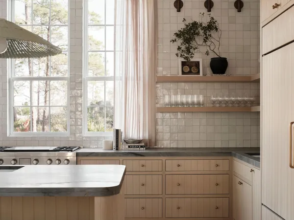 a kitchen with a sink and a window