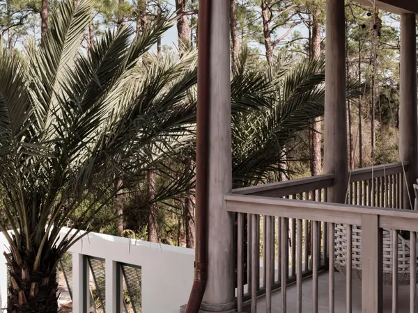 a view of a house with a tree
