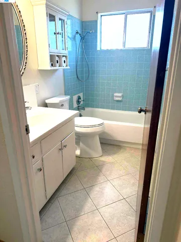 a bathroom with a sink a toilet and a bathtub