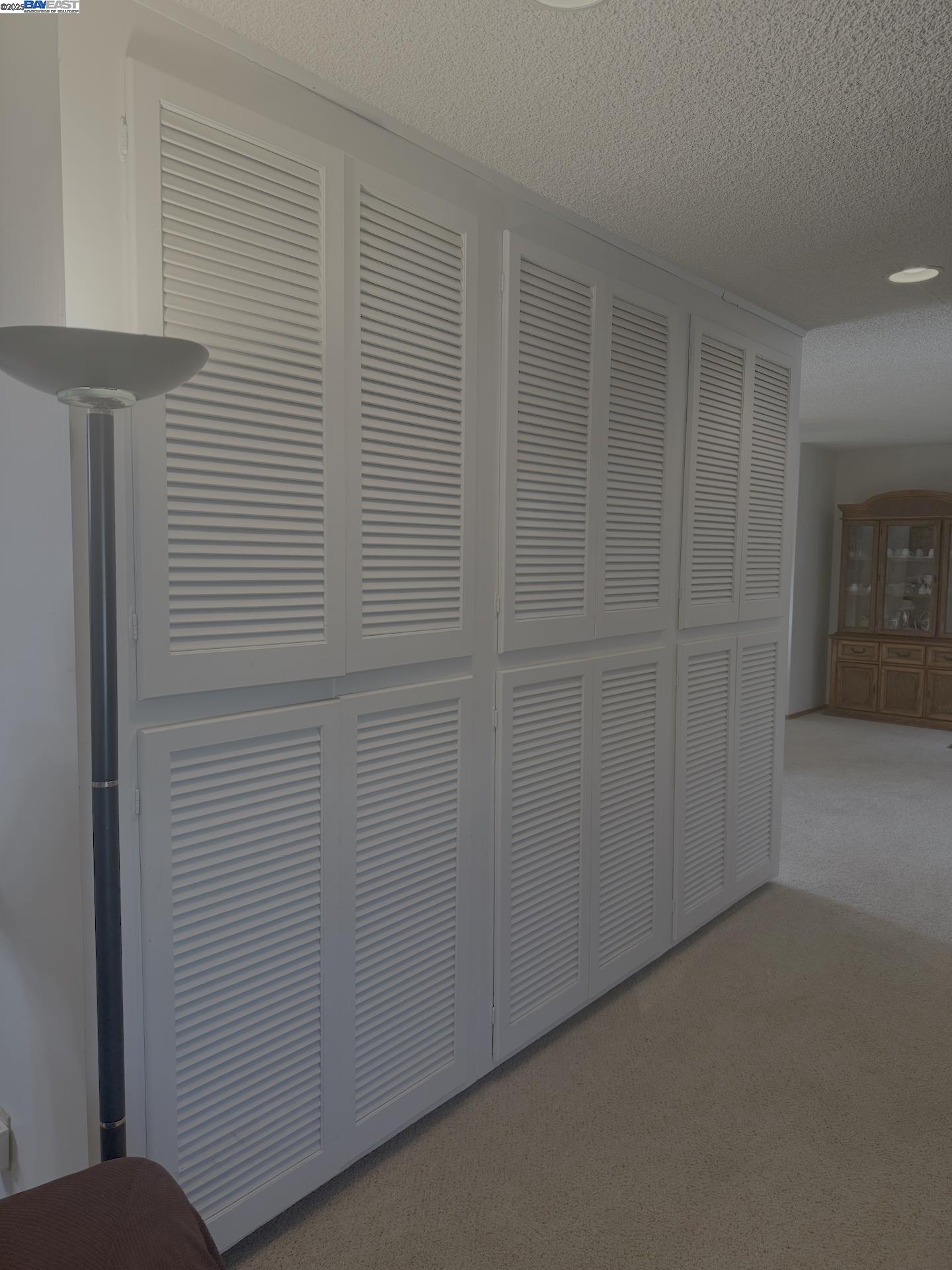 701 North 3rd Street Patterson, CA 95363 - Photo 19 of 23 an empty room with windows