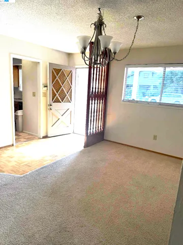 a view of a livingroom with a staircase