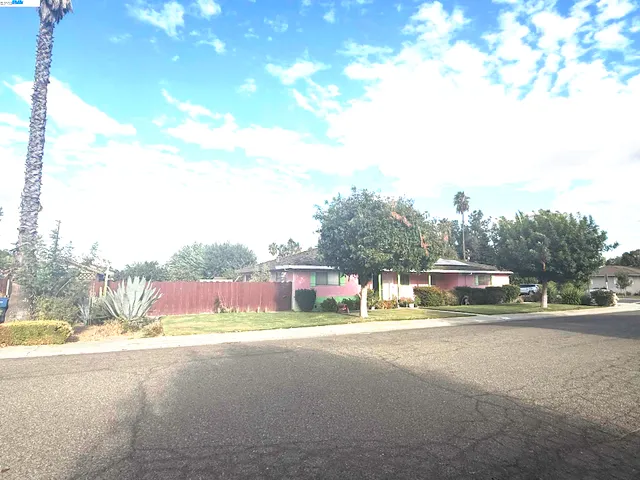a view of swimming pool with an outdoor seating
