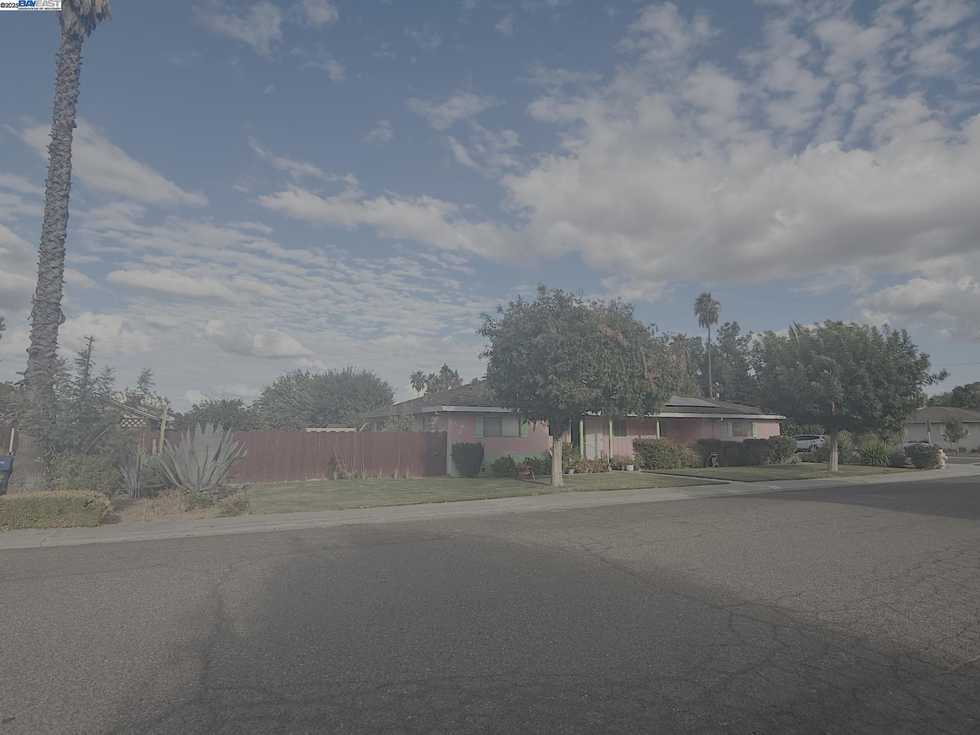 701 North 3rd Street Patterson, CA 95363 - Photo 3 of 23 a view of swimming pool with an outdoor seating