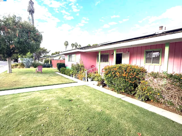 a house view with a outdoor space