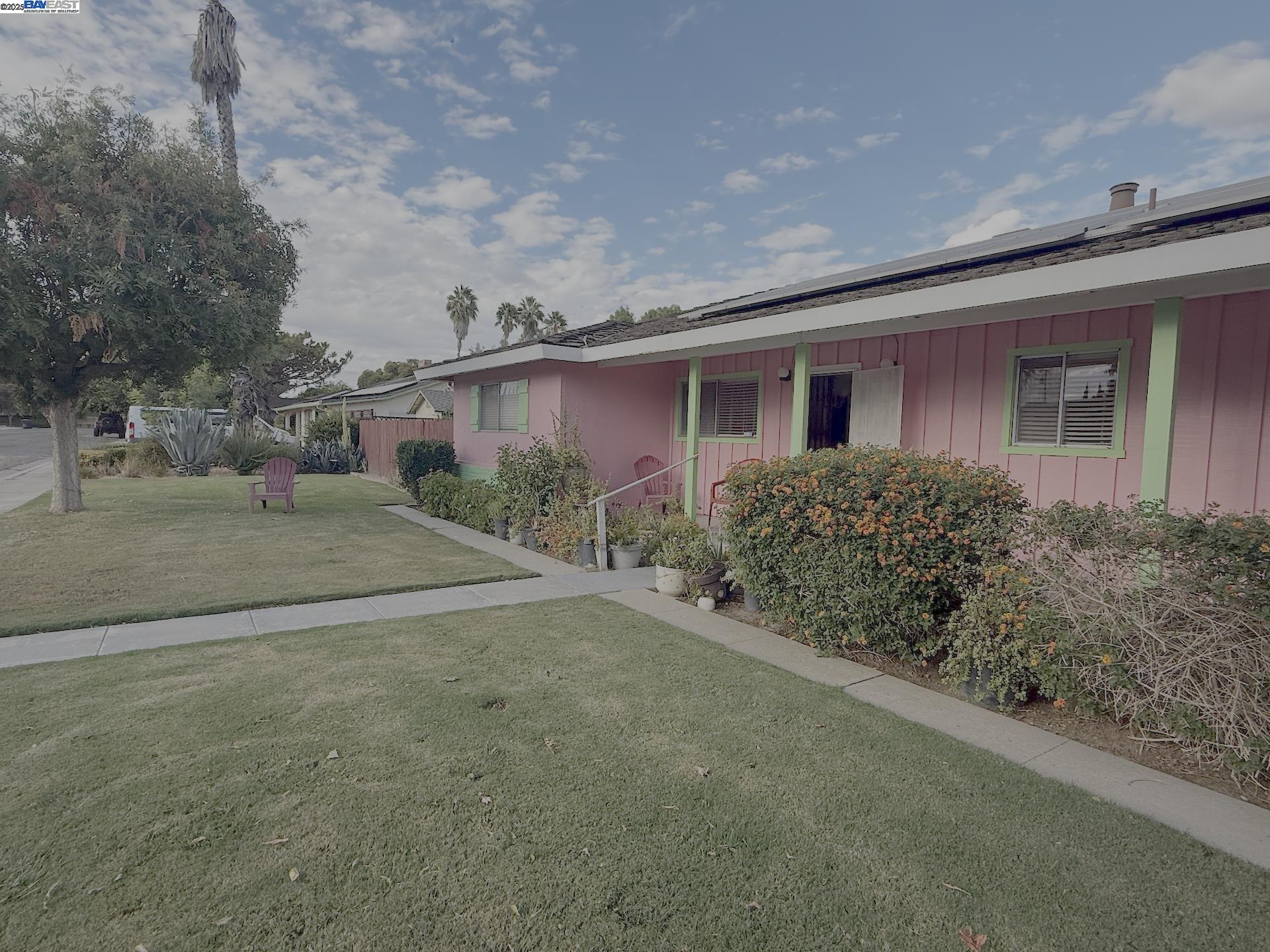 701 North 3rd Street Patterson, CA 95363 - Photo 7 of 23 a house view with a outdoor space