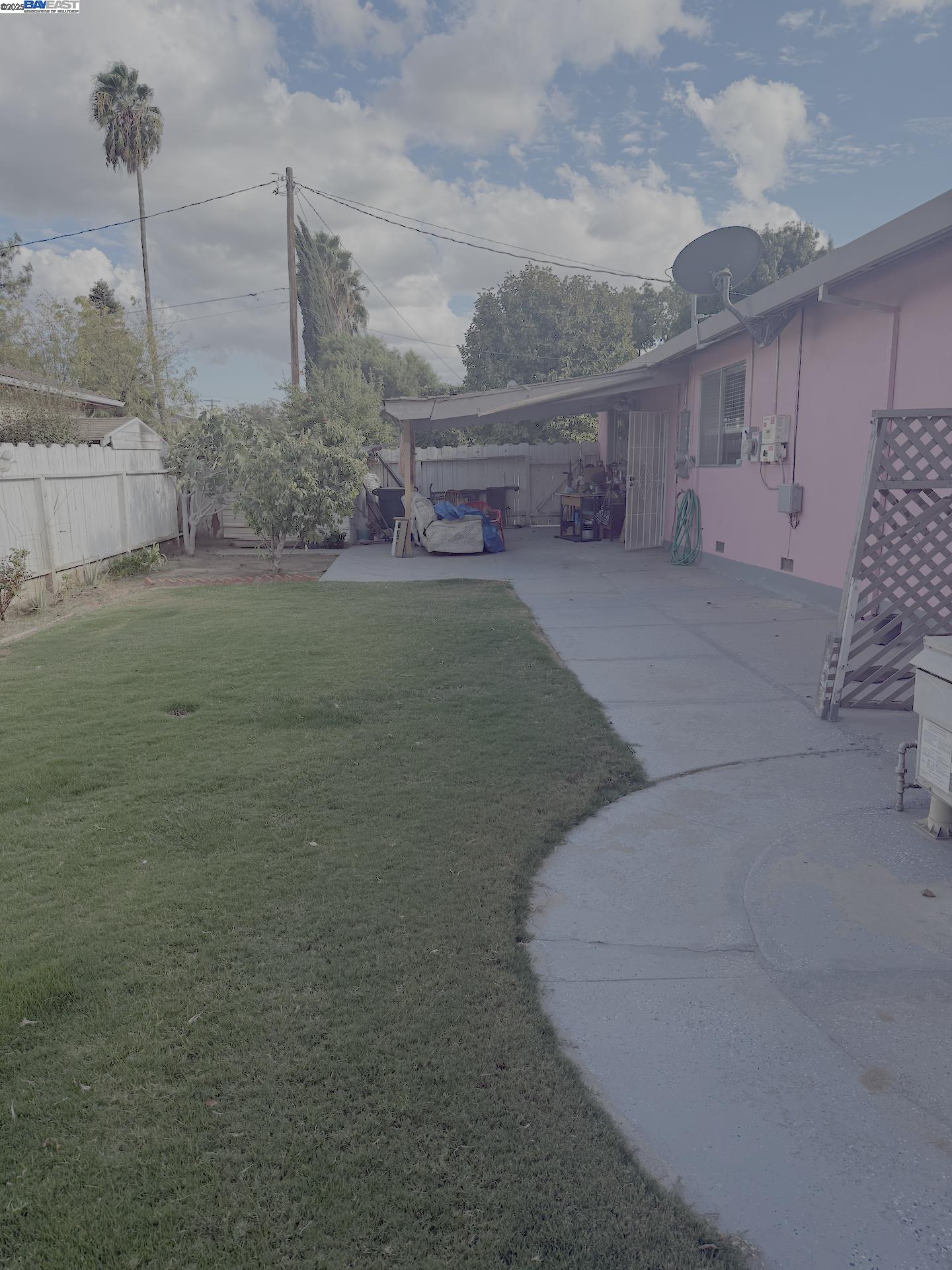 701 North 3rd Street Patterson, CA 95363 - Photo 9 of 23 a view of a house with a yard