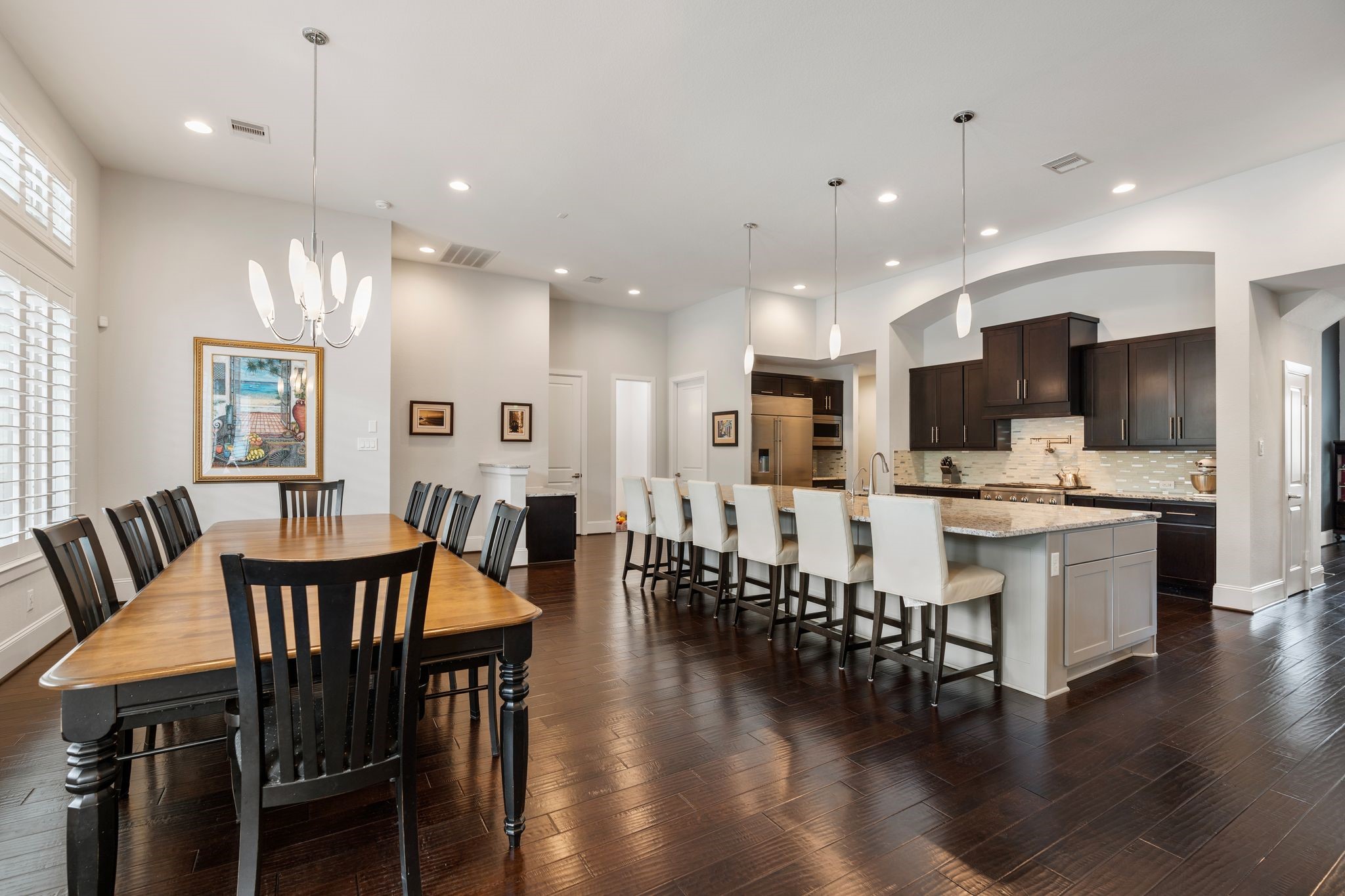 2926 Fairmont Ridge Lane Katy, TX 77494 - Photo 21 of 49 a large kitchen with a table and chairs