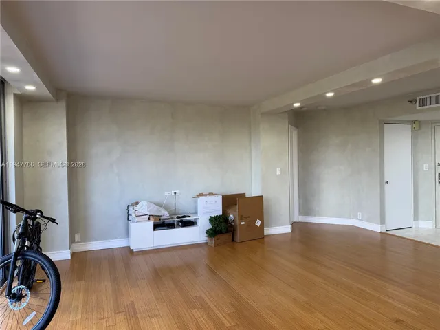 a view of balcony with furniture