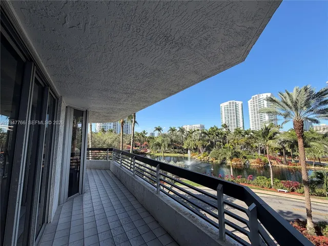 a kitchen with a sink appliances and cabinets