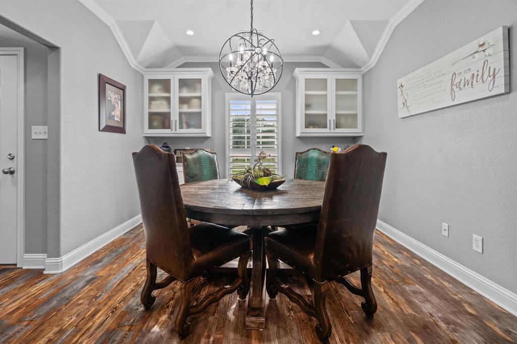 175 Porter Road Bartonville, TX 76226 - Photo 12 of 40 a view of a dining room with furniture window and wooden floor