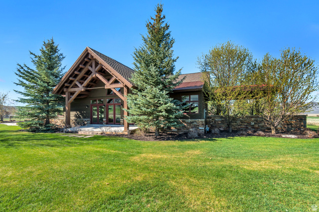 2579 Splendor Valley Road Kamas, UT 84036 - Photo 4 of 87 Back of house with a yard, a patio area, and french doors